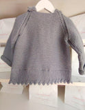 Capuchón gris